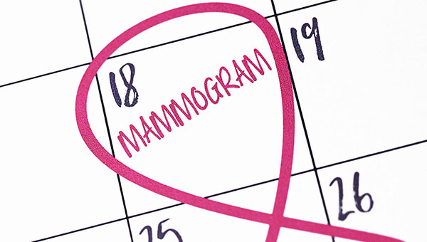 Calendar with a day circled and the word mammogram written in it.