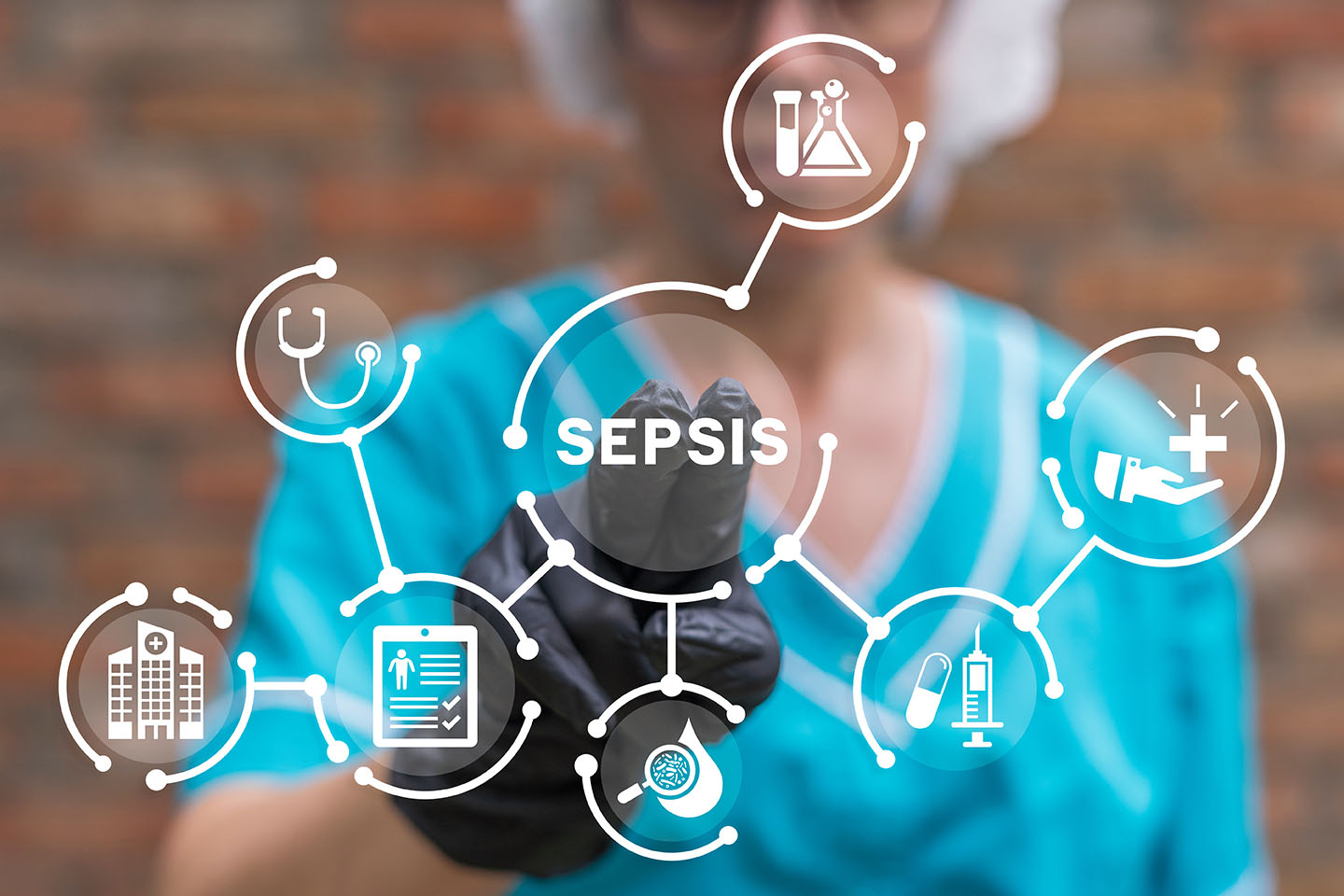 Clinical woman pointing at screen with various icons, including the word Sepsis.