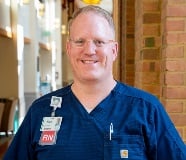 Head and shoulders photo of Nick Muir, RN.