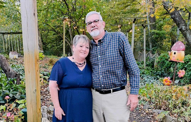 Photo of Vivian and Pat White in garden.