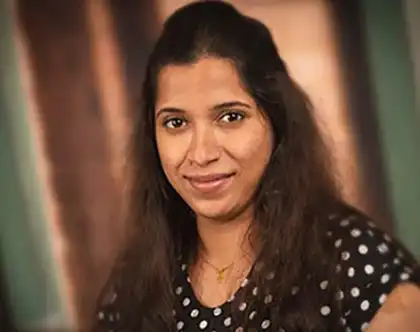 Manjusha Thenozhiyil, MD portrait.